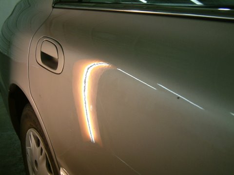 Dent repaired on Honda Accord without painting