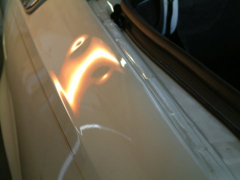 Hail Damage on Cadillac Sedand deVille Quarter
