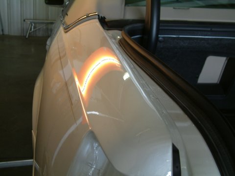 After hail damage repair using PDR on Cadillac Sedan deVille