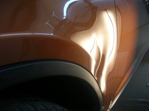 Infiniti Fender Dent Before repair 