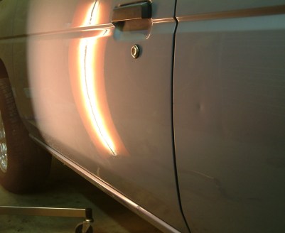 After PDR Nissan frontier truck dent on door