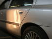 volvo door dent thumbnail before paintless repair