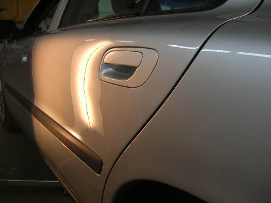 Paintless repair made this Volvo left rear door look good once again